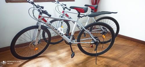 two bikes parked next to each other in a room at Mount Elegence in Nuwara Eliya