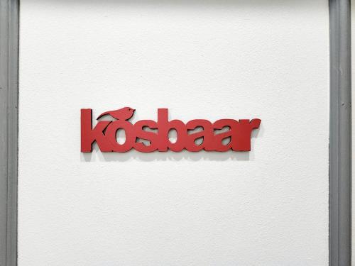 a koska sign on a white wall with the word kosaza at Be My Guest Too in Upington