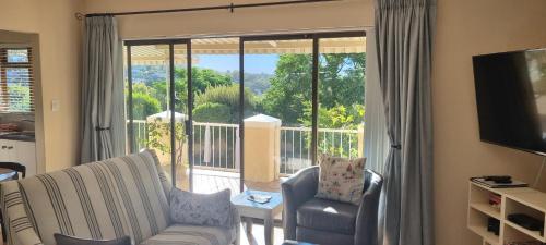 Televisyen dan/atau pusat hiburan di SomerZicht Guest House