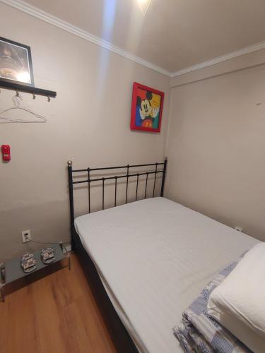 Кровать или кровати в номере Joy Guesthouse