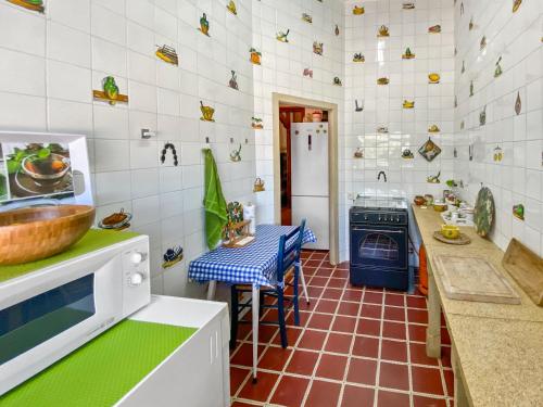 Η κουζίνα ή μικρή κουζίνα στο Huerto Valenciano - Sol y Tranquilidad - Piscina