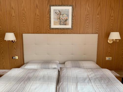 Residence Ravisa Dolomitesにあるベッド
