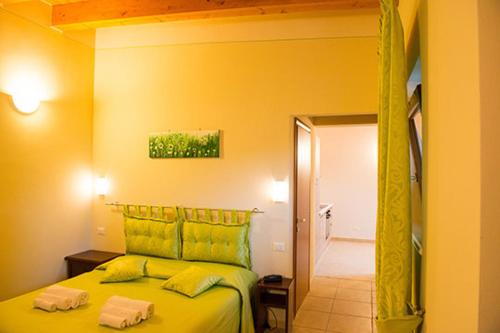 Postel nebo postele na pokoji v ubytování Le Murette Apartments - ENJOY HOLIDAY