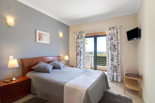 Postel nebo postele na pokoji v ubytování Apartamento T1 - Em zona tranquila