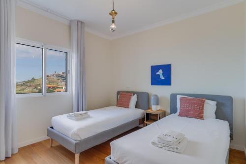 Postel nebo postele na pokoji v ubytování Costa Azul