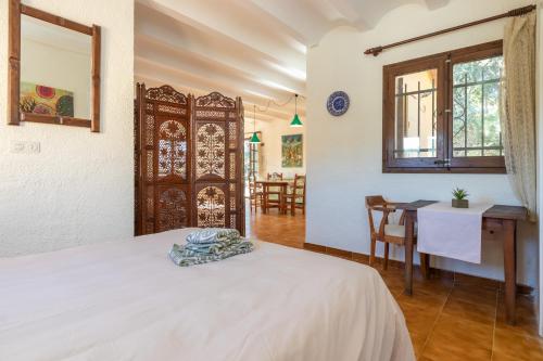 Katil atau katil-katil dalam bilik di Casita en Begur