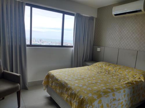 Ένα ή περισσότερα κρεβάτια σε δωμάτιο στο Beach Class Ilha do Leite 2606