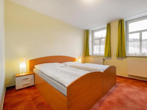 Ένα ή περισσότερα κρεβάτια σε δωμάτιο στο Apartment Base Camp 3 by Interhome