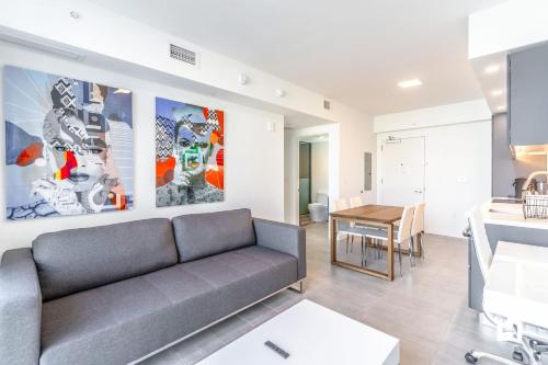 a living room with a couch and a table at Downtown Miami Condos by Lua Host in Miami