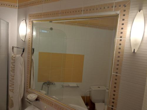 a bathroom with a shower and a sink and a toilet at Studio Apollonia in Alexandroupoli