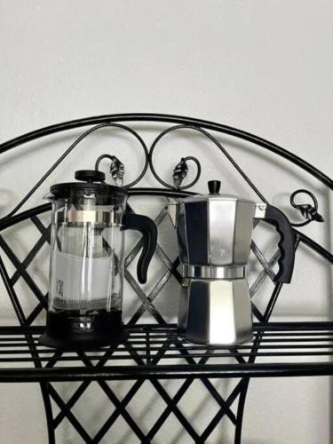 a blender and a tea kettle on a shelf at Close to Disney and the Beaches Full House 3/3 in Orlando