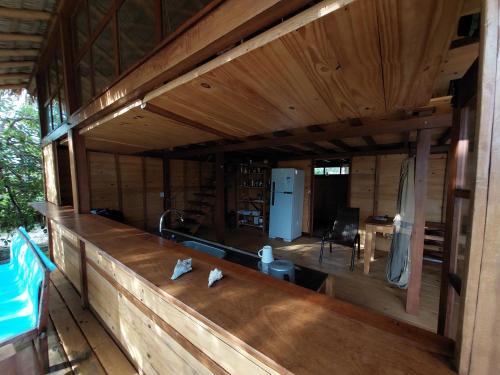 a view of the inside of a wooden house at Casa de Atins in Atins