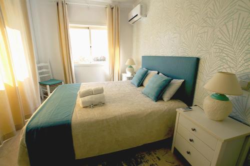 Ένα ή περισσότερα κρεβάτια σε δωμάτιο στο Lemon - Cozy apartment near Marina - Vilamoura