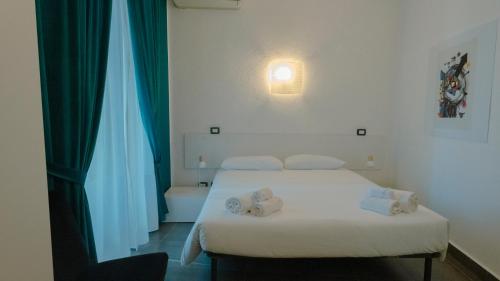 Postel nebo postele na pokoji v ubytování Rooms 19 - Rooms and Breakfast