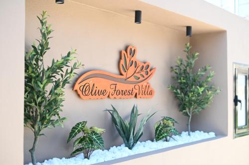Certificato, attestato, insegna o altro documento esposto da Olive Forest Villa
