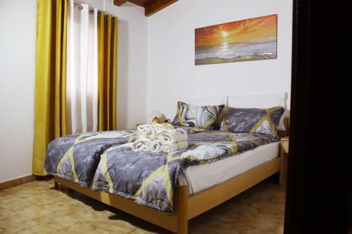 a bedroom with a bed in a room at Appartamento con vista Lago Casa Gaspar in Brenzone sul Garda