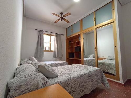 Posteľ alebo postele v izbe v ubytovaní Vivienda Agustín Durán