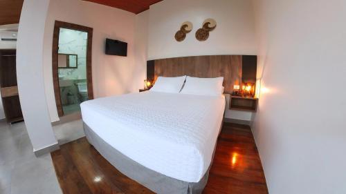 La Mar Hotel Playas房間的床
