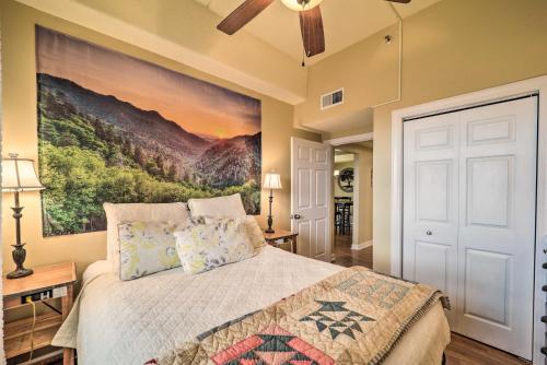 una camera da letto con un letto e un dipinto sul muro di 3 Mi to Sugar Mountain Resort Condo with Balcony! a Sugar Mountain