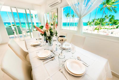 Beachfront Punta Cana Condo for Rent - Ocean View, Private Terrace, and BBQ