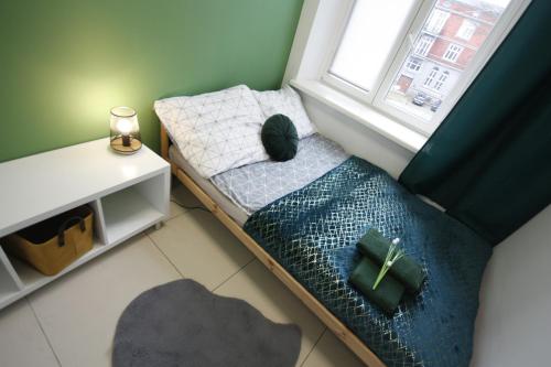 Krevet ili kreveti u jedinici u okviru objekta Apartament na Starym Mieście