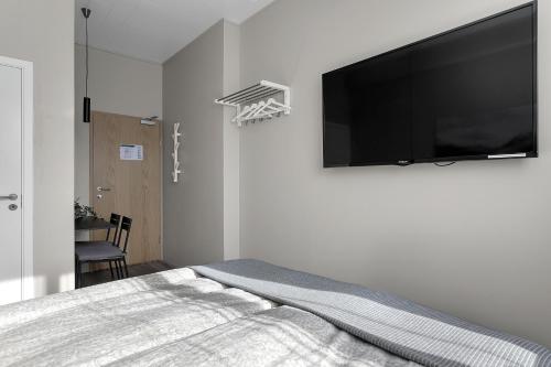TV a/nebo společenská místnost v ubytování NN Urban Guesthouse