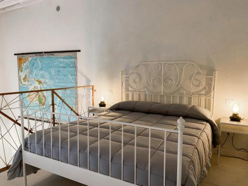 Postel nebo postele na pokoji v ubytování Nelle Antiche Mura