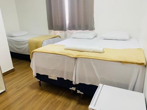 Cama o camas de una habitación en Hotel Santorine Plaza