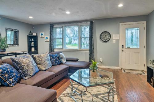 a living room with a couch and a table at Day Trip to D C! Spacious Fort Washington Home in Fort Washington