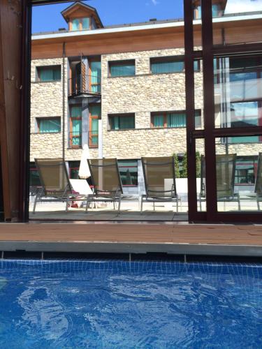 Bazén v ubytování SOMMOS Hotel Aneto nebo v jeho okolí