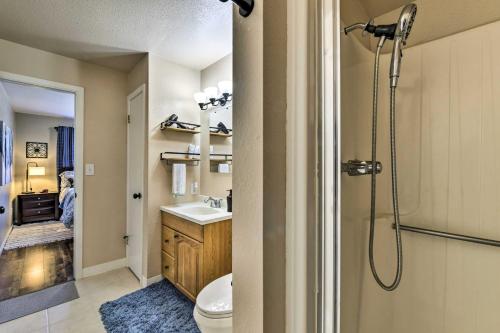 a bathroom with a shower and a toilet and a sink at Family-Friendly Chandler Home Near Downtown! in Chandler