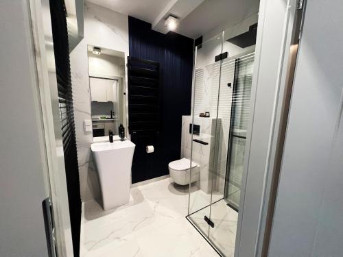 Ένα μπάνιο στο K20 Apartamenty Łódź - Dostęp na Kod