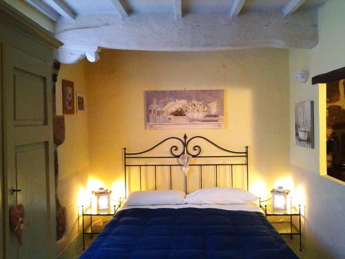 Cama ou camas em um quarto em Appartamenti a Pitigliano