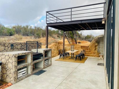 Фотография из галереи Cabaña Valzam 2 entre viñedos Rancho Tecate Resort в городе Текате