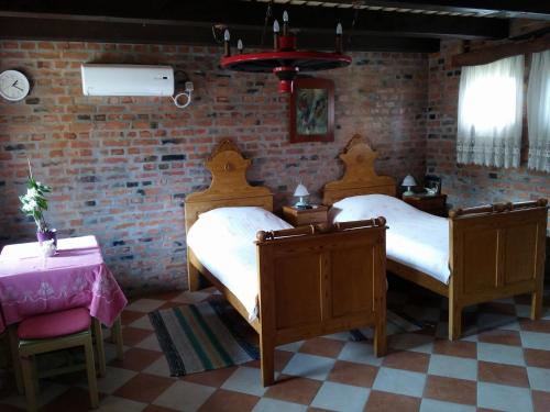 Villa Palma tesisinde bir odada yatak veya yataklar