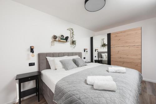 Postel nebo postele na pokoji v ubytování Aura Exclusive Apartment & Room
