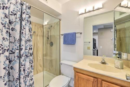 a bathroom with a toilet and a shower and a sink at Less Than 1 Mi to Golf Home with Screened Porch in Sun City in Sun City West