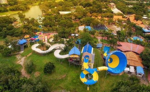 an aerial view of a water park with a roller coaster at Aisis Home at Afamosa in Kampong Alor Gajah