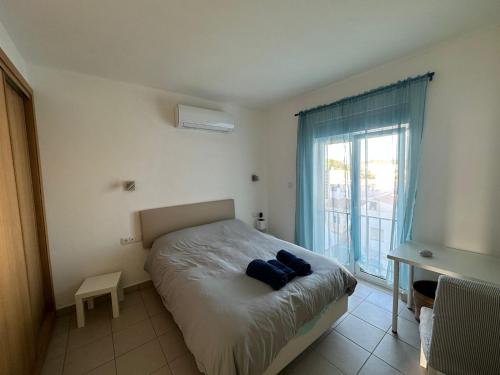 En eller flere senge i et værelse på Casa Sea Love Luz