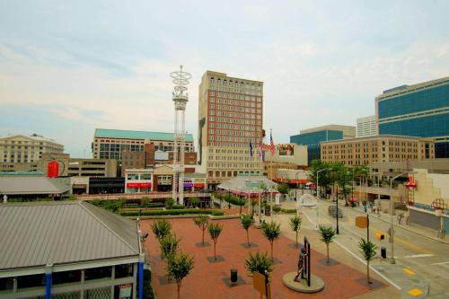 a city with a clock tower in the middle of a city at The Connally Hotel Downtown Atlanta, an Ascend Collection Hotel in Atlanta