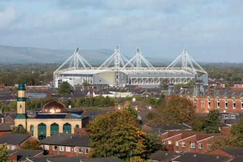 a view of a large stadium in a city at Holiday Inn Preston by IHG in Preston