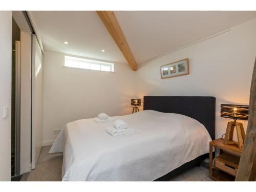Postel nebo postele na pokoji v ubytování Holiday home in a rural atmosphere in beautiful Oostkapelle