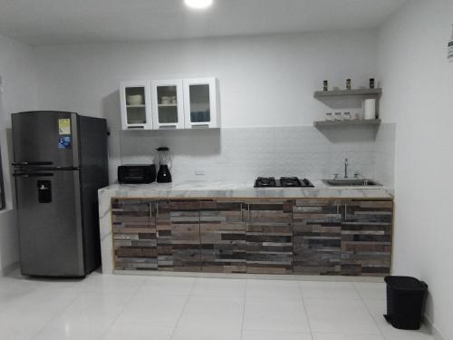 Una cocina o kitchenette en Apartamento con ubicación estratégica