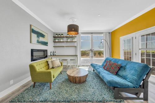 a living room with a couch and a chair at Luxe & Comfy Vineyard Estate ~ Breathtaking Views! in Clarksburg