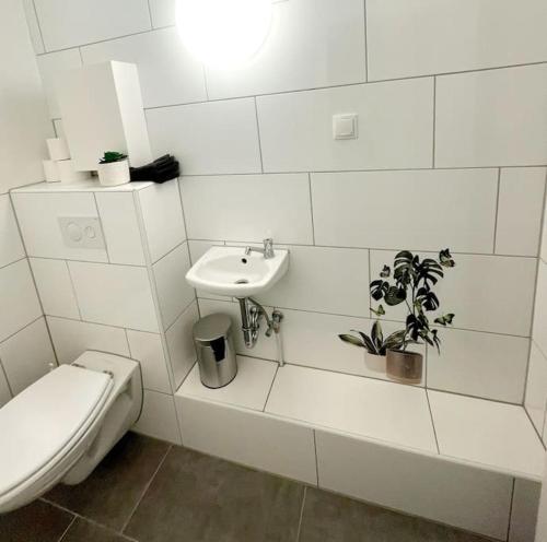 Koupelna v ubytování Große 3-Zimmer Wohnung, zentrale Lage.