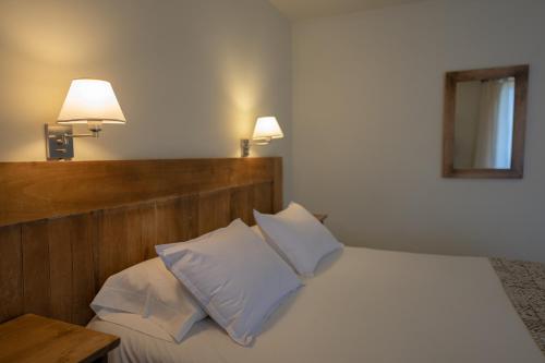 Postel nebo postele na pokoji v ubytování Hosteria Kaiken