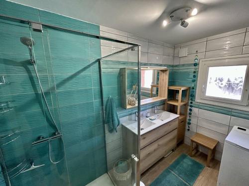 a bathroom with a glass shower and a sink at Sublime Villa Climatisée Familiale avec Extérieurs Spacieux – Quartier Calme - FR-1-388-215 in Argelès-sur-Mer