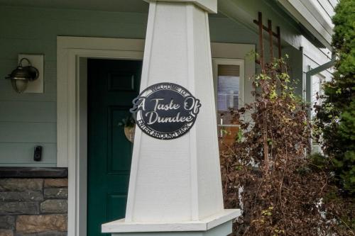 a house of dummies sign on the front door of a house at A Taste Of Dundee in Dundee