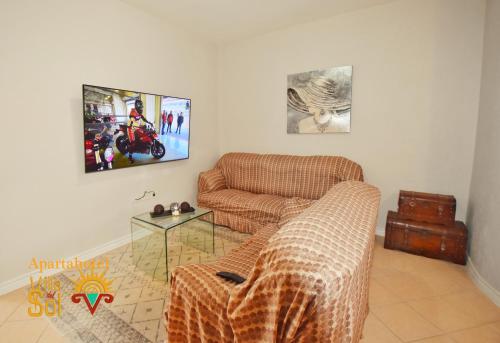 a living room with a couch and a table at Villa Del Sol in Ixmiquilpan