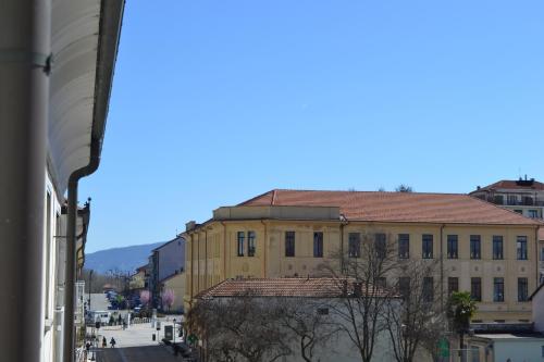 a view of a building from a street at A Pochi Passi in Venaria Reale